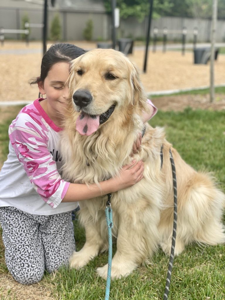 little girl Sisi and dog Charlie